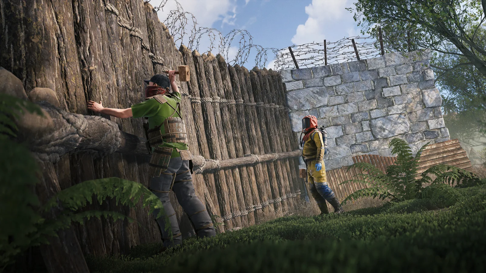 Rust players and defenses around an upgraded external wall